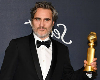 Joaquin Phoenix with Academy Award