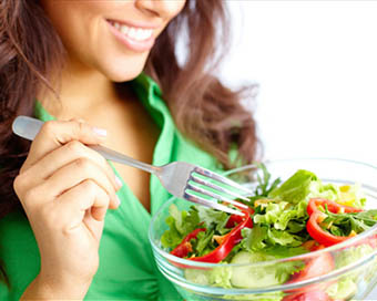 Lady eating plant-based meal