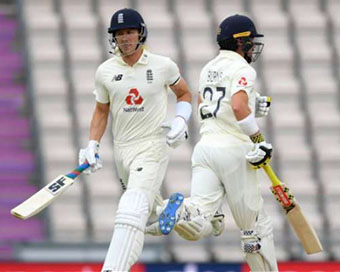 Rory Burns and Joe Denly running between the wickets