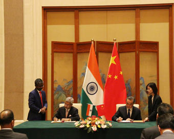 Beijing: External Affairs Minister S Jaishankar and his Chinese counterpart Wang Yi during the agreement signing ceremony in Beijing on Aug 12, 2019. (Photo: IANS/MEA)