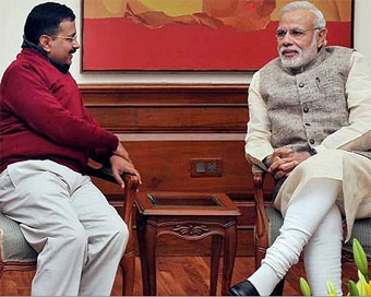 Delhi CM Arvind Kejriwal with PM Narendra Modi (file photo)