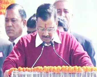 Arivnd Kejriwal taking oath as Chief Minister of Delhi