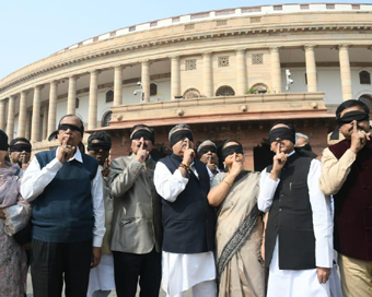 TMC MPs protest against Centre in Parliament premises