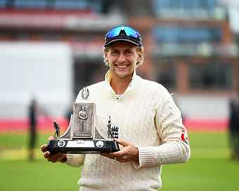 England skipper Joe Root with the Wisden Trophy