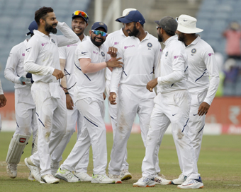 Pune: Indian players celebrate after winning the second Test match against South Africa at Maharashtra Cricket Association Stadium in Pune, on Oct 13, 2019. India won by an innings and 137 runs. (Photo: Surjeet Yadav/IANS)