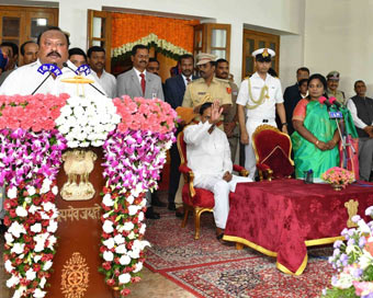  Hyderabad: Telangana Governor Tamilisai Soundararajan in the presence Chief Minister K Chandrashekar Rao, administers the oath of office to TRS MLA Gangula Kamalakar as a Cabinet Minister during a swearing-in ceremony, in Hyderabad on Sep 8, 2019. (