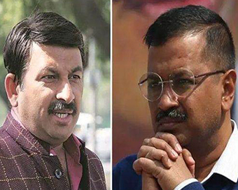 Manoj Tiwari, Arvind Kejriwal (file photo)